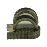 Bearing set from the side showing the flanged thrust bearing perched on top of the stacked shell halves, all sealed in clear shrink-wrap