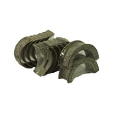 Fanned out view of the seven bearing pairs still sealed in their original preservative film, including the flanged thrust main at right