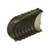 Angled three-quarter view of the wrapped bearing set showing the locating tab notches on the parting faces of each shell