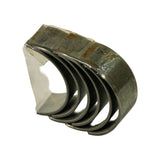 Opposite end of the bundle showing the taped joint and the uniform curvature of all six half-shells