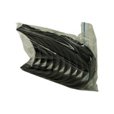 Opposite-angled view of sealed bag showing nested bearing shells in profile, faint white label partially visible through the plastic on the far side