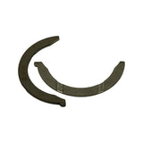 One half shown face-up with back marking, the other shown grooved-face up, confirming the set contains two identical half-washers