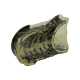 Angled perspective view of the same sealed bundle, VCI paper strip and shell backs visible through the shrink-wrap