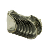 End-on close-up of sealed shell stack showing polished inner bearing surfaces and flanged outer (thrust) shells, wrap still intact
