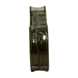 Edge-on profile of shrink-wrapped bearing stack showing the flanged thrust bearing face and plain bearing backs