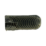 Bearing shells sealed in clear shrink-wrap, side view showing nested half-shells with oil grooves visible