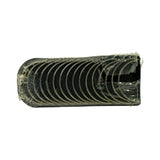 Flat side view of the full set through the plastic wrap, oil holes visible along the centreline of several shells confirming rod-bearing construction