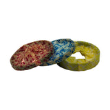 Three ring bundles stacked at an angle, showing the colour-coded waxed-paper wrappers — red printed '1st', blue printed '2nd', yellow printed 'OIL' — all seals intact