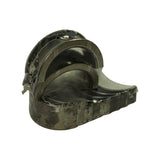 Angled side view of stacked shells with flanged centre thrust bearing clearly visible above smaller non-flanged mains