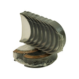 Reverse angle of the shell stack with the flanged thrust bearing halves laid on their copper-coloured thrust faces beneath