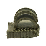 Bearings nested in sealed plastic film; edges of lower shells stamped '0.75 6' repeating across all positions, with locating tabs visible