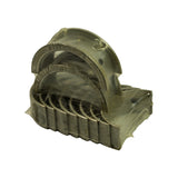 Top-down angle showing all bearing positions nested together with faint King part-number printing visible inside the upper shell bore surface