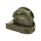 Angled view emphasising flange on thrust bearing and the stepped stacking of lower shells; edge stampings '0.75' clearly legible