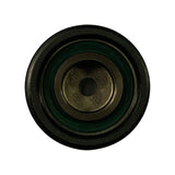 Face-on view of tensioner pulley showing the front bearing face. Green-tinted rubber triple-lip seal visible around inner race. Machined steel inner hub with central smooth bore (no thread). Inscription visible around seal perimeter at lower portion.