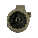 Reverse face (opposite rubber element face) showing the alloy housing back; rubber isolator visible from rear, offset side bracket with three blind-bore mounting studs. Surface shows light casting marks and minor shelf dust consistent with NOS storage.