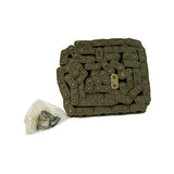 Overhead view of the full chain coiled in a loose stack with a small clear plastic bag of joining-link hardware (connecting pins and side plates) beside it; a single brass-coloured master link is visible among the dark steel links