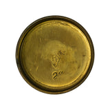 Recessed (installation) face of the plug showing two stamped markings: a diamond-shaped 'Pp' logo (Premier Engine Components maker's mark) and the size designation '2"' (2 inches).