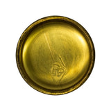 Concave inner/rear face showing flanged sealing rim and pressed diamond-shield logo with interlocked 'PP' or 'RP' monogram at centre; machining marks radiate from centre; rim shows slight age oxidation