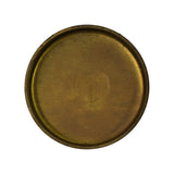 Flat top-down view of concave face showing recessed rim detail and aged brass surface with light surface oxidation and tool marks
