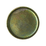 Flat top-down view of concave (reverse) face showing recessed seating rim around full circumference; surface shows rust spotting, iridescent zinc finish deterioration, and a light scratch across centre
