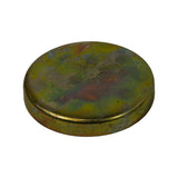 Three-quarter angled view of convex (outer/domed) face showing dome profile and rim height; iridescent zinc-chromate finish with moderate rust discolouration; no markings visible