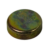 Three-quarter angled view of convex (outer/domed) face showing GM diamond logo and '1 7/32"' size stamp on dome; dome profile and rim depth visible; zinc-chromate finish with moderate rust discolouration