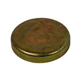 Three-quarter angled view of convex (outer/domed) face showing dome profile and rim depth; heavy rust blush across dome with residual iridescent green zinc-chromate at rim; GM logo and size stamp faintly visible on dome