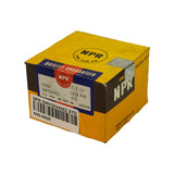 Three-quarter angle showing front and right side of box. Blue and red 'Quality Guaranteed Piston Ring Set' banner across top, NPR logo on side panel, 'Nippon Piston Ring Co., Ltd. Made in Japan' text on side. Retailer barcode sticker partially visible.