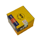 Top view of box showing NPR Nippon Piston Ring logo on lid. Silver holographic security/authenticity sticker affixed to lid. 'Custom Made' text on right side panel. Box corners show age-related wear.