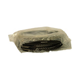 Side/profile view of ring set in poly bag showing full 6-cylinder stacked ring pack laid flat. Multiple ring layers visible — compression rings and oil control rails clearly distinguishable in the stack. Bag is sealed and undisturbed.