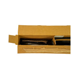Angled top-down view into open box, left compartment showing stacked cast iron compression rings with visible wavy Flex-Vent expander for oil ring set; right compartment clearly shows steel oil ring rails.
