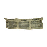 Reverse of the inner paper-wrapped ring bundle showing bilingual (English/Spanish) installation instructions including ring groove assignments: top groove, 2nd groove, and 3rd (oil) groove positioning diagrams.