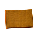 Side profile showing pleated paper element depth and orange urethane end caps