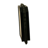 Edge-on side profile showing the thickness of the filter body, pleated paper sandwiched between moulded rubber sealing lips