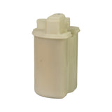 Rear elevated view showing opposite side of top cap with additional small round port stub; fluted body profile with rounded bottom corners; cream plastic, no visible wear