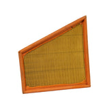 Direct face-on shot of the clean air (intake) side — full yellow pleated panel with orange surround, showing the non-rectangular parallelogram profile clearly.