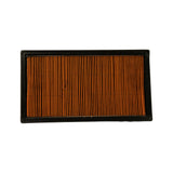 Top-down view showing fine pleat spacing across full media face, black rubber frame border