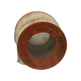 Bottom end-on view showing open hollow core, orange rubber end cap sealing ring, and pleated paper media around circumference. Wrap intact with minor tears at edges.