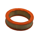 Three-quarter view from above showing top orange end cap and outer pleated media; filter sitting flat, clean and uninstalled.