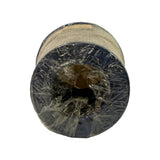 Top-down view of filter element, showing circular profile with pleated paper filter media visible inside the hollow centre bore. Blue rubber end cap and perforated metal casing around perimeter. Plastic wrap gathered over the opening.