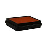Side and bottom view of filter element showing shallow depth of the flat panel format. 'MADE IN JAPAN' moulded text clearly visible on lower housing edge. Orange media visible from top. Black stepped plastic housing profile shown.