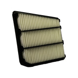 Side/angled view of filter element showing the tall pleated paper media edge-on from one long side. Black plastic frame flanges at top and bottom visible; four horizontal internal support ribs visible across the pleat face. Pleat depth and density consistent with OEM-spec panel filter.