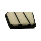 Top face of the filter from a low, close angle showing the pleated paper element and black frame rim. Three-column layout clearly visible; pleat tips appear clean white with no contamination. Frame lip geometry confirms flat panel style.