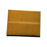 Angled side-on view of filter showing depth of pleated paper element and dark rubber/foam surround on bottom and side edges.