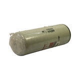 Three-quarter top-down side view showing barcode label area and partial brand text. Stamp or print partially visible reading what appears to be 'STAMFORD CT USA' or similar — manufacturer origin text. Label soiled but wrap intact.