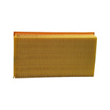 Long-side profile showing the depth of the pleated paper media and the orange poly seal cap along the top edge
