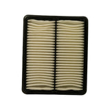 Filter face-on from intake side: flat rectangular panel, cream pleated paper element in two columns separated by a centre rib, black rubber-edged perimeter frame. Good unused condition.