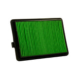 Three-quarter angle view from top-right showing filter depth and frame thickness. Green pleated element and black frame clearly visible; filter sits flat with no flanges beyond frame.