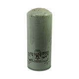 Reverse side of filter canister showing installation instructions diagram (3-step spin-on procedure) and manufacturer text 'WIX Corporation, Gastonia N.C., Made in U.S.A.' Minor surface scuffs and shelf wear to paint.