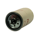 Base plate view of filter canister showing central threaded inlet port (female thread, rubber-sealed), five evenly spaced inlet holes in a circular pattern around the centre, and metal seam at base. 'Z1110' partially visible on the body.